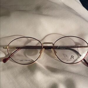 Source Unknown Gold and Red Glasses